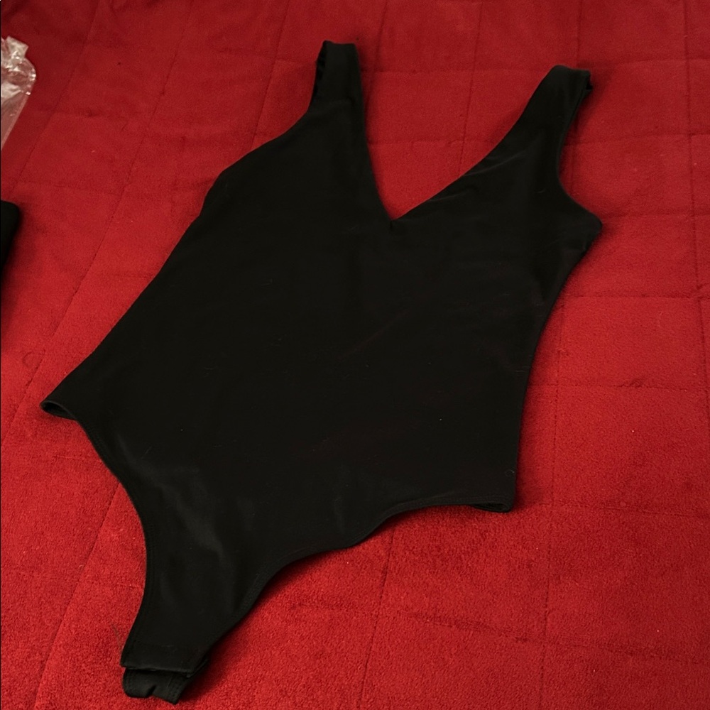 Black One Piece bodysuit